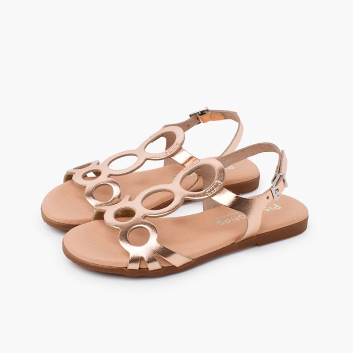 Leather sandals with circles and buckle closure