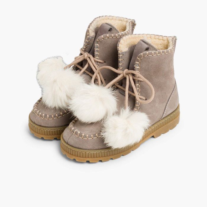 Womens fur boots with pom poms top
